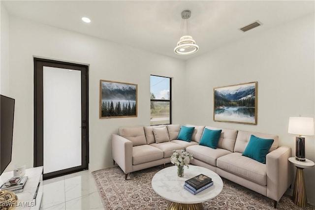 living room with a chandelier