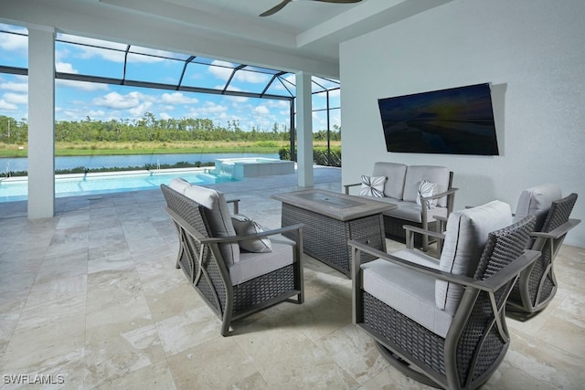 view of patio featuring an outdoor hangout area, a water view, and a lanai