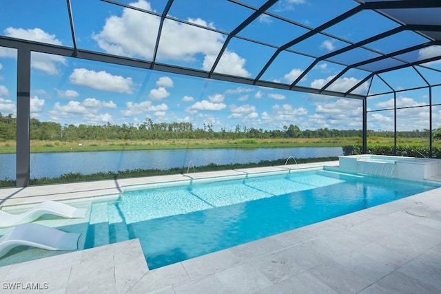 view of pool featuring a patio, an in ground hot tub, a water view, and glass enclosure