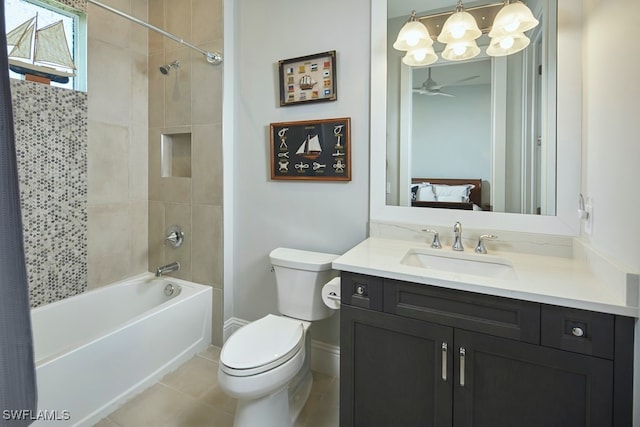 full bathroom featuring vanity, toilet, tile patterned floors, and shower / tub combo