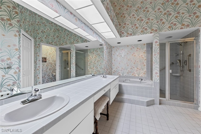 bathroom featuring vanity, separate shower and tub, and tile patterned flooring