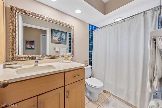 bathroom with vanity, toilet, tile patterned floors, and a shower with curtain