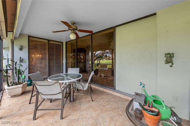 view of patio featuring ceiling fan