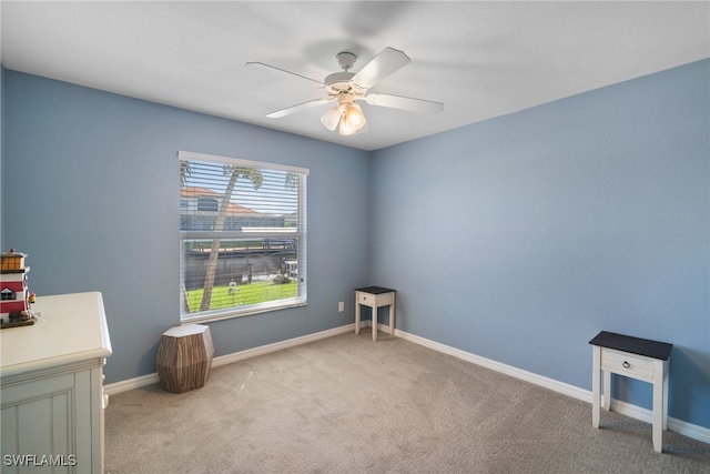 interior space featuring ceiling fan