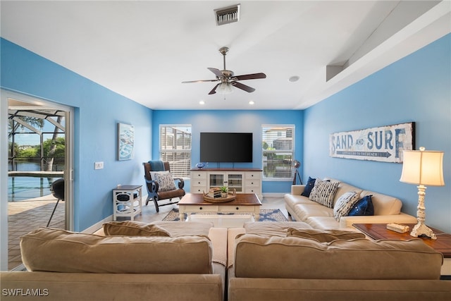 living room featuring ceiling fan