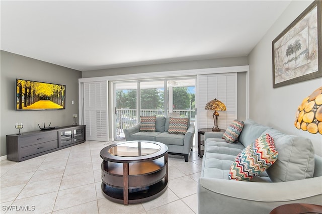 living room with light tile patterned floors