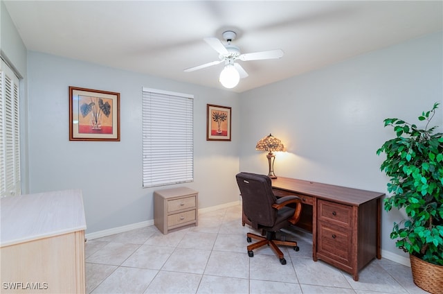 home office featuring ceiling fan and light tile patterned floors