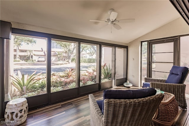 sunroom / solarium with ceiling fan and lofted ceiling