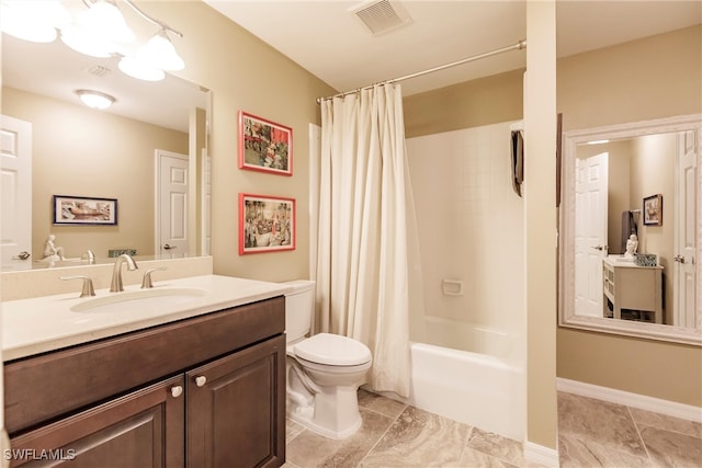 full bathroom with toilet, vanity, and shower / tub combo with curtain