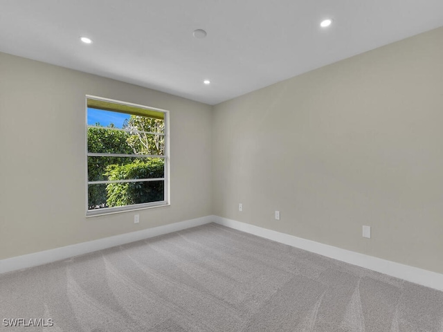 view of carpeted spare room