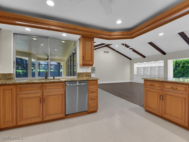 kitchen featuring vaulted ceiling with beams, a healthy amount of sunlight, light hardwood / wood-style floors, and dishwasher