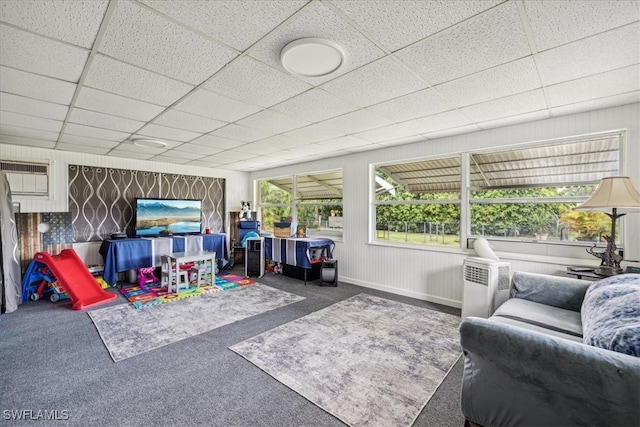 sunroom featuring a drop ceiling