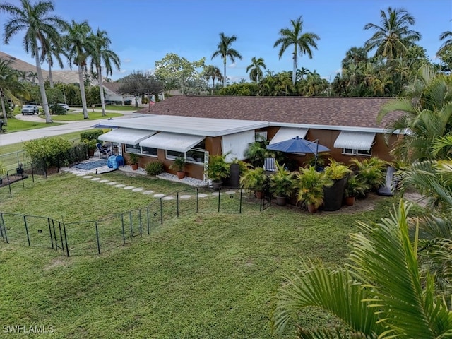 exterior space with a front lawn