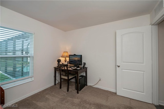 home office featuring light colored carpet