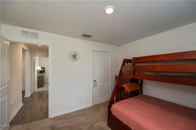 bedroom featuring wood-type flooring