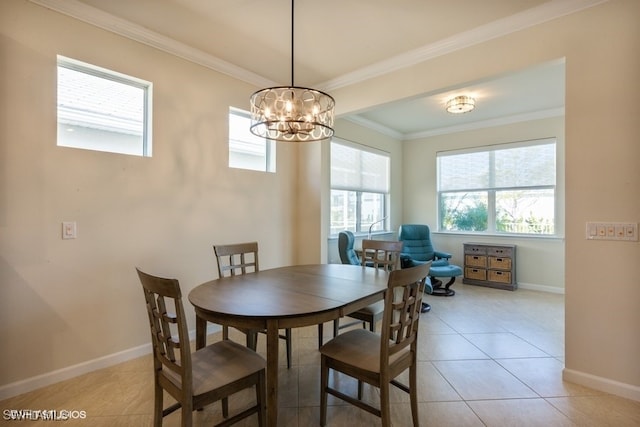 dining area featuring crown molding, an inviting chandelier, and light tile patterned floors