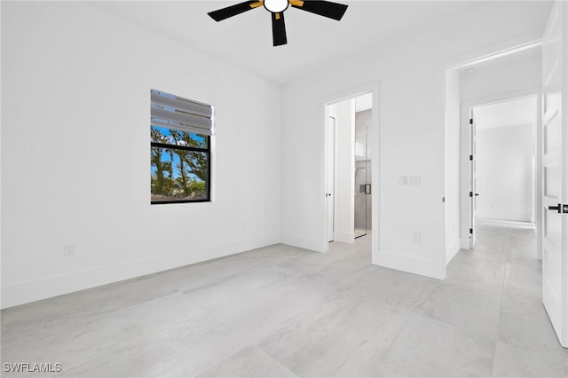 unfurnished bedroom featuring ceiling fan