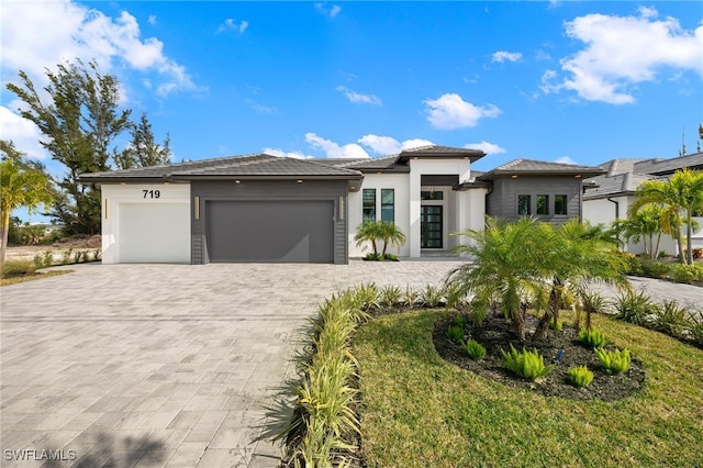 view of front of property with a garage