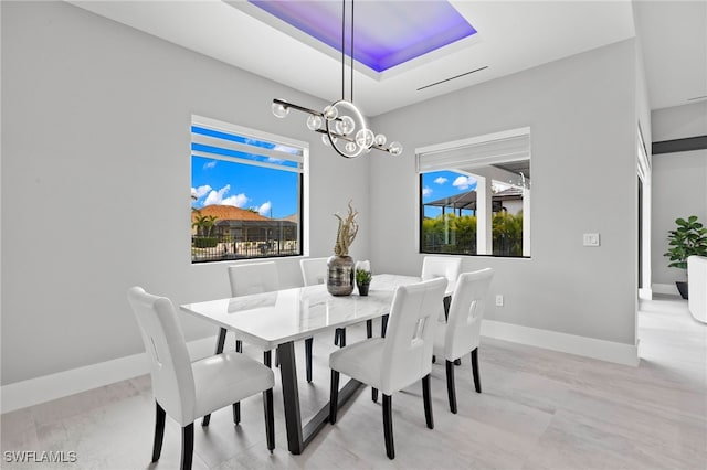 dining space featuring a healthy amount of sunlight