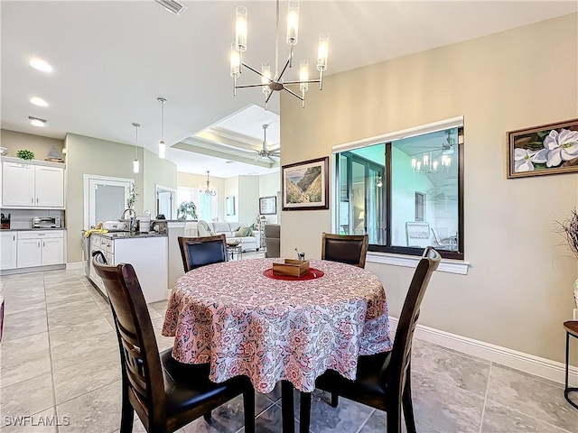 646 NE 5th Place, Cape Coral, FL 33909 - dining space featuring a chandelier, baseboards, light tile patterned floors, and recessed lighting