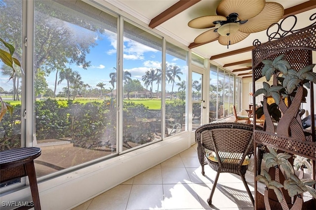 197 Harrison Rd Unit 7-3, Naples, FL 34112 - sunroom / solarium with a ceiling fan, view of golf course, and beam ceiling