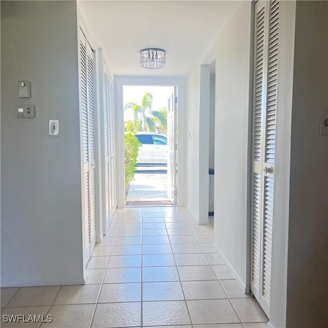 hallway featuring light tile patterned flooring