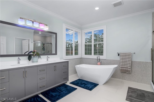 bathroom featuring vanity, plus walk in shower, tile patterned floors, tile walls, and crown molding