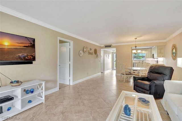 living room featuring an inviting chandelier, light tile patterned floors, and crown molding