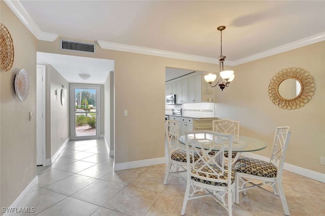 tiled dining space with an inviting chandelier and crown molding