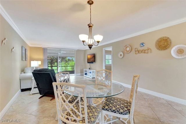 tiled dining room with an inviting chandelier, a healthy amount of sunlight, and crown molding