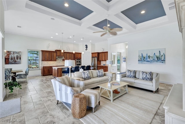 living room featuring coffered ceiling, ceiling fan, a healthy amount of sunlight, and crown molding