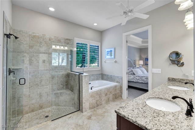 bathroom with vanity, shower with separate bathtub, ceiling fan, and tile patterned flooring