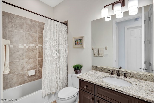 full bathroom featuring vanity, toilet, and shower / bathtub combination with curtain