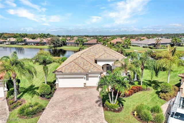 bird's eye view with a water view