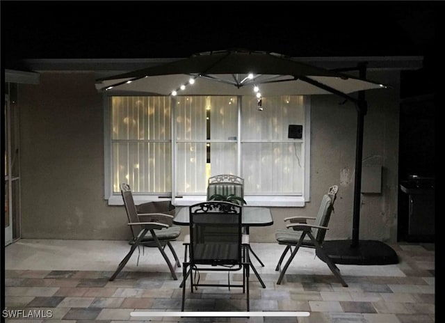 view of patio at night