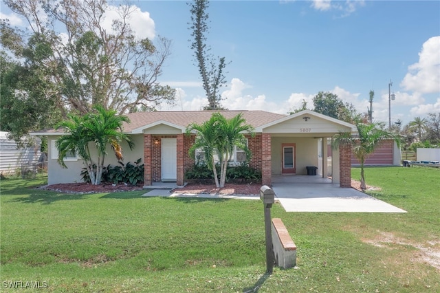 single story home with a carport and a front lawn