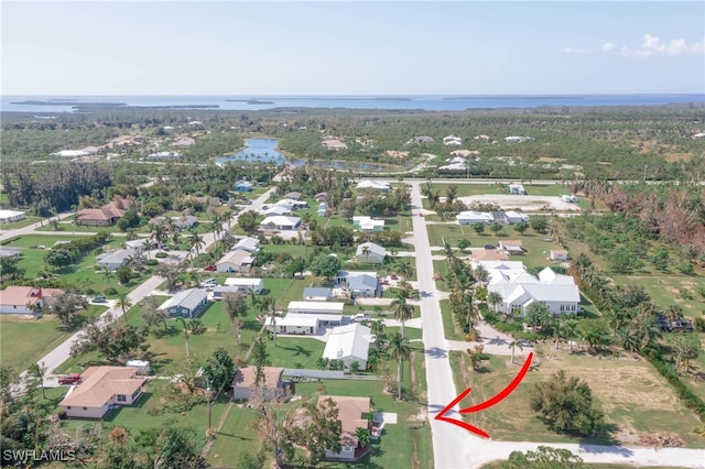5807 Cubles Dr, Bokeelia, FL 33922 - drone / aerial view with a residential view and a water view