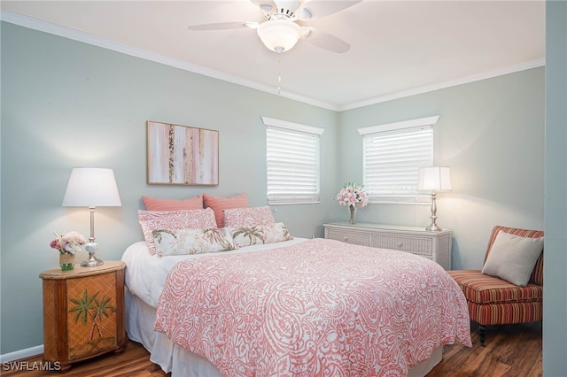 bedroom with ornamental molding, hardwood / wood-style flooring, and ceiling fan