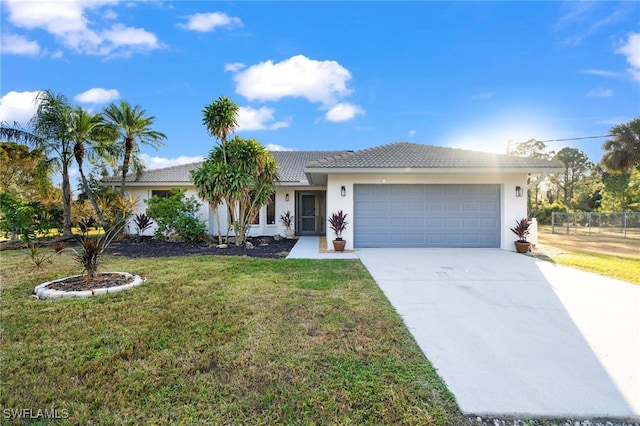 single story home featuring a tiled roof, an attached garage, concrete driveway, and stucco siding