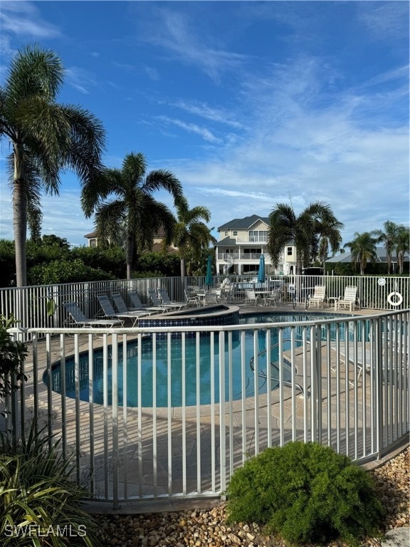 view of swimming pool with a patio area