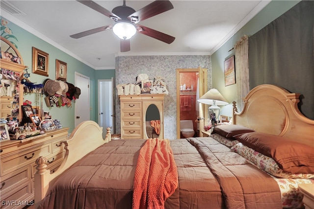 bedroom with ornamental molding, ensuite bathroom, and ceiling fan