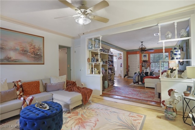 living room featuring ornamental molding and ceiling fan