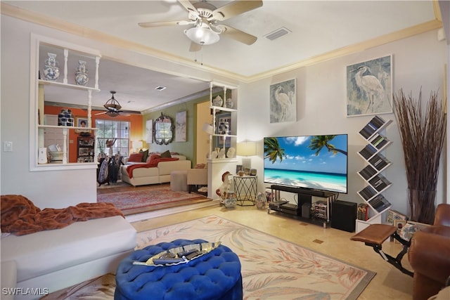 living room featuring crown molding and ceiling fan