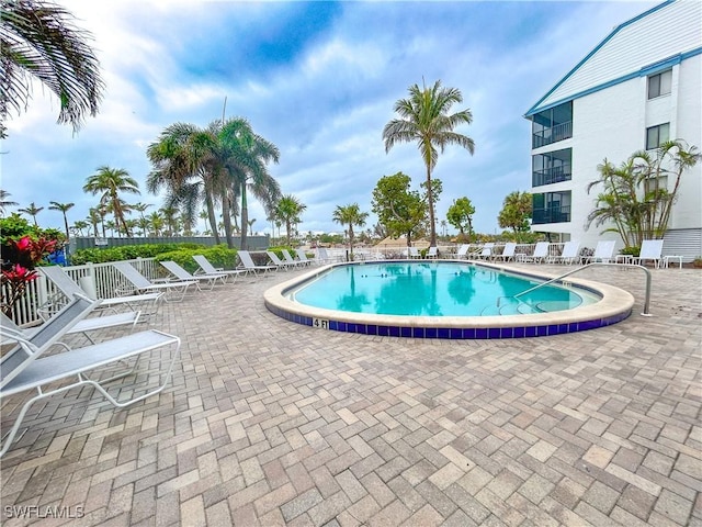 community pool featuring a patio