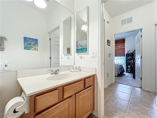 bathroom featuring vanity and tile patterned floors