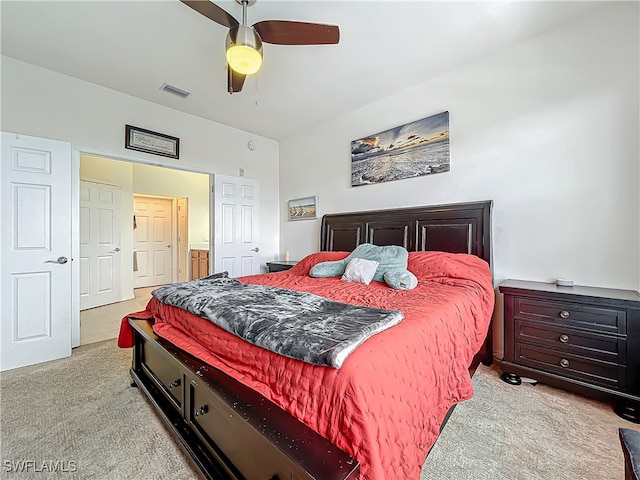 carpeted bedroom featuring ceiling fan