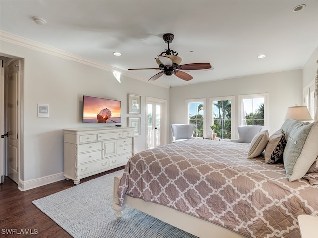 bedroom with crown molding, hardwood / wood-style flooring, and ceiling fan