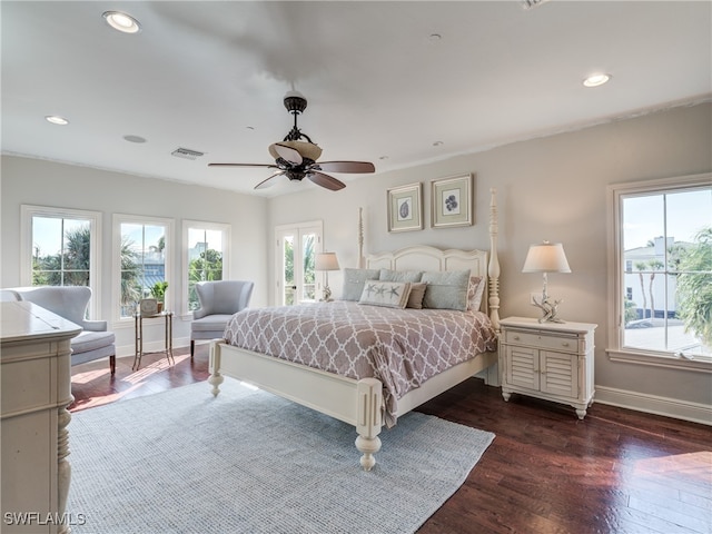 bedroom featuring dark wood-type flooring and ceiling fan