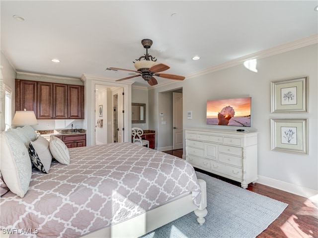 bedroom with ornamental molding, hardwood / wood-style flooring, and ceiling fan