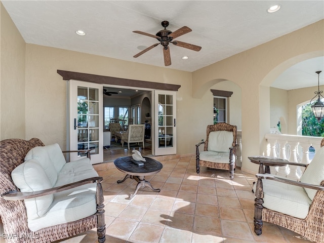 view of patio featuring ceiling fan